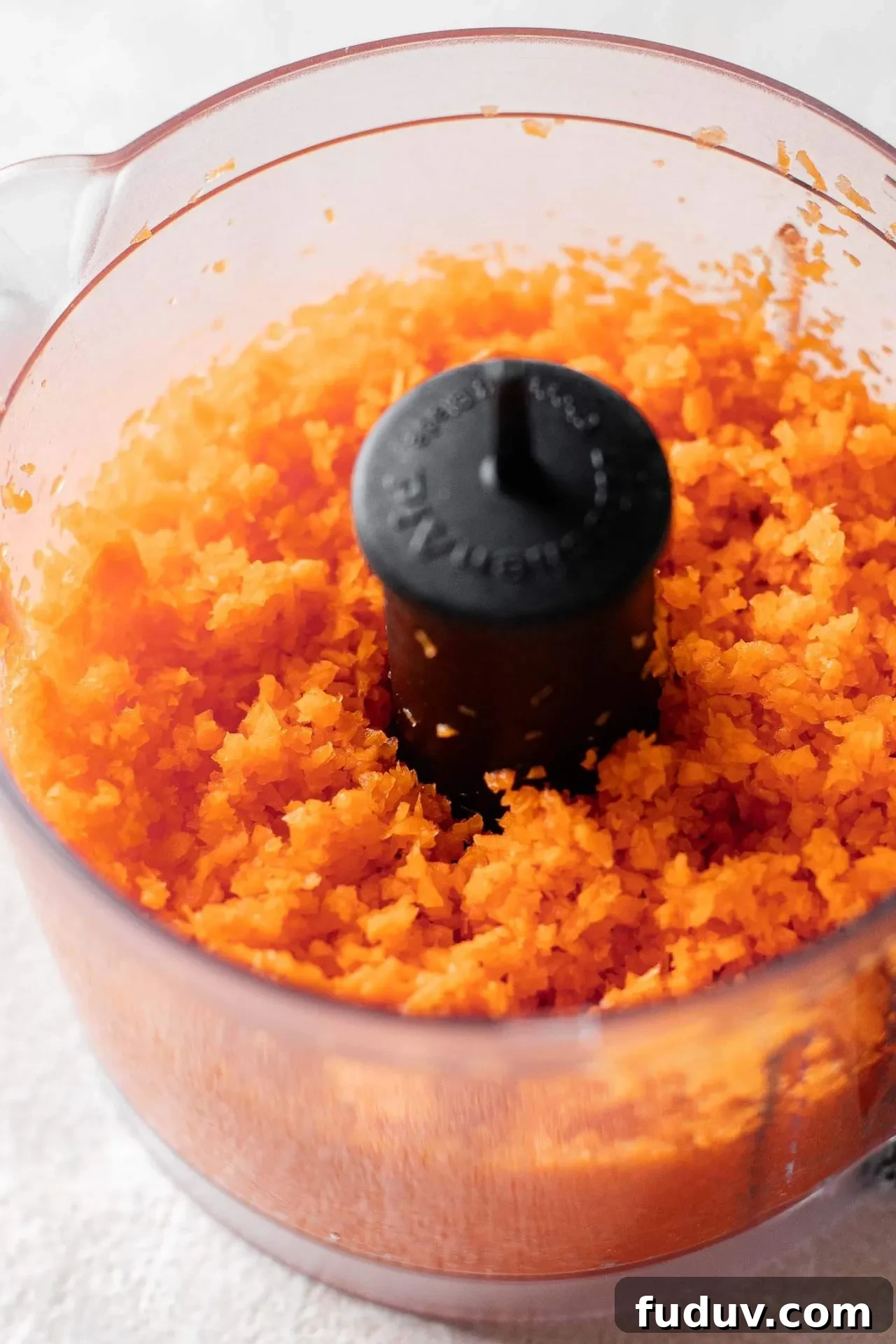 MOIST carrot bread fine carrot pieces in mini food processor bowl