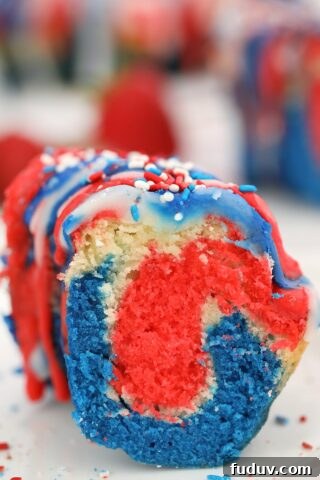 A slice of patriotic bundt cake in red, white, and blue colors.