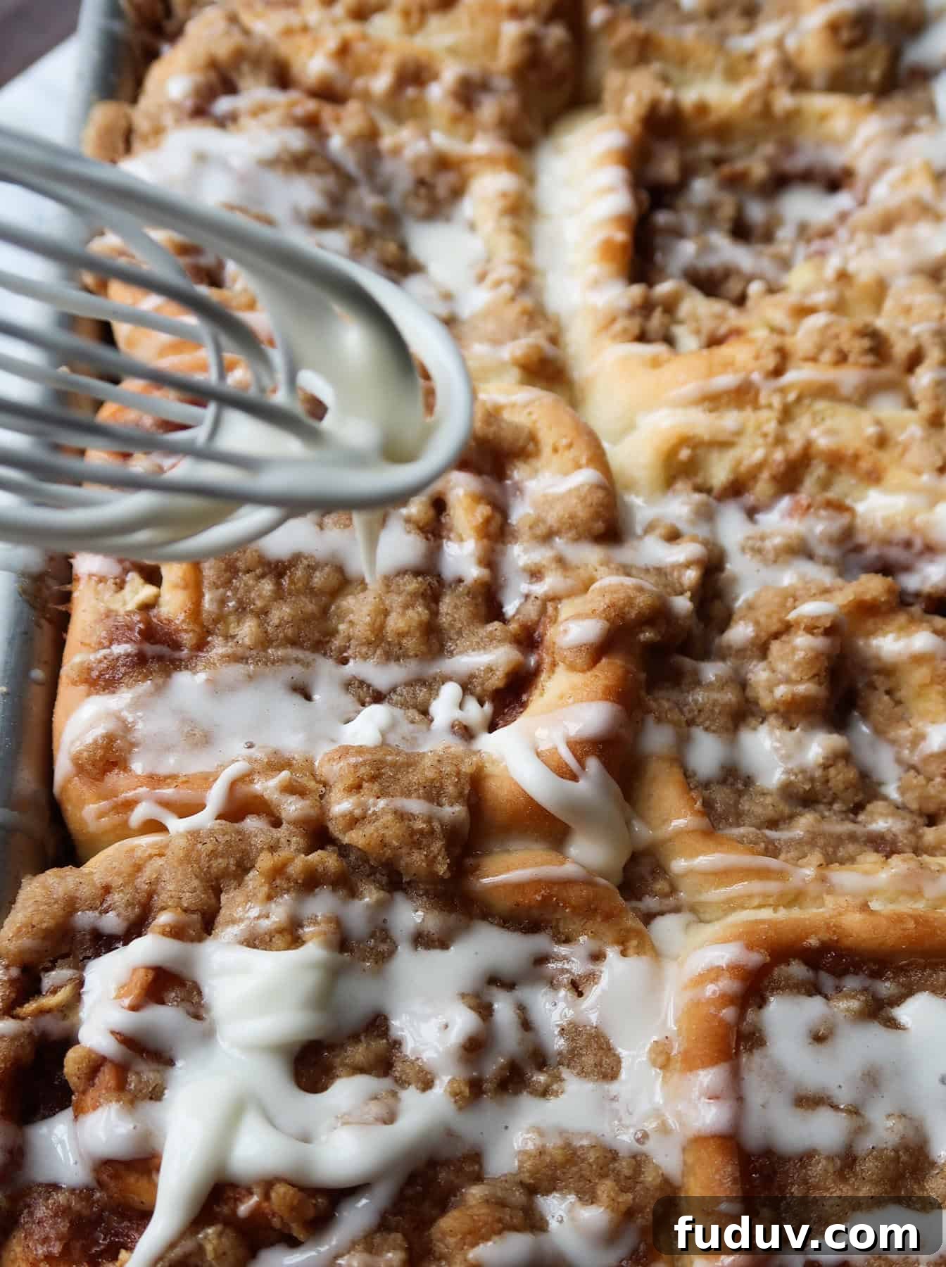 Apple Crumb Cinnamon Rolls are soft, delicious cinnamon rolls filled with diced apples and topped with crumb topping. It’s the perfect mash-up of two classic breakfast sweets, crumb cake and cinnamon rolls! Apple Crumb Cinnamon Rolls
