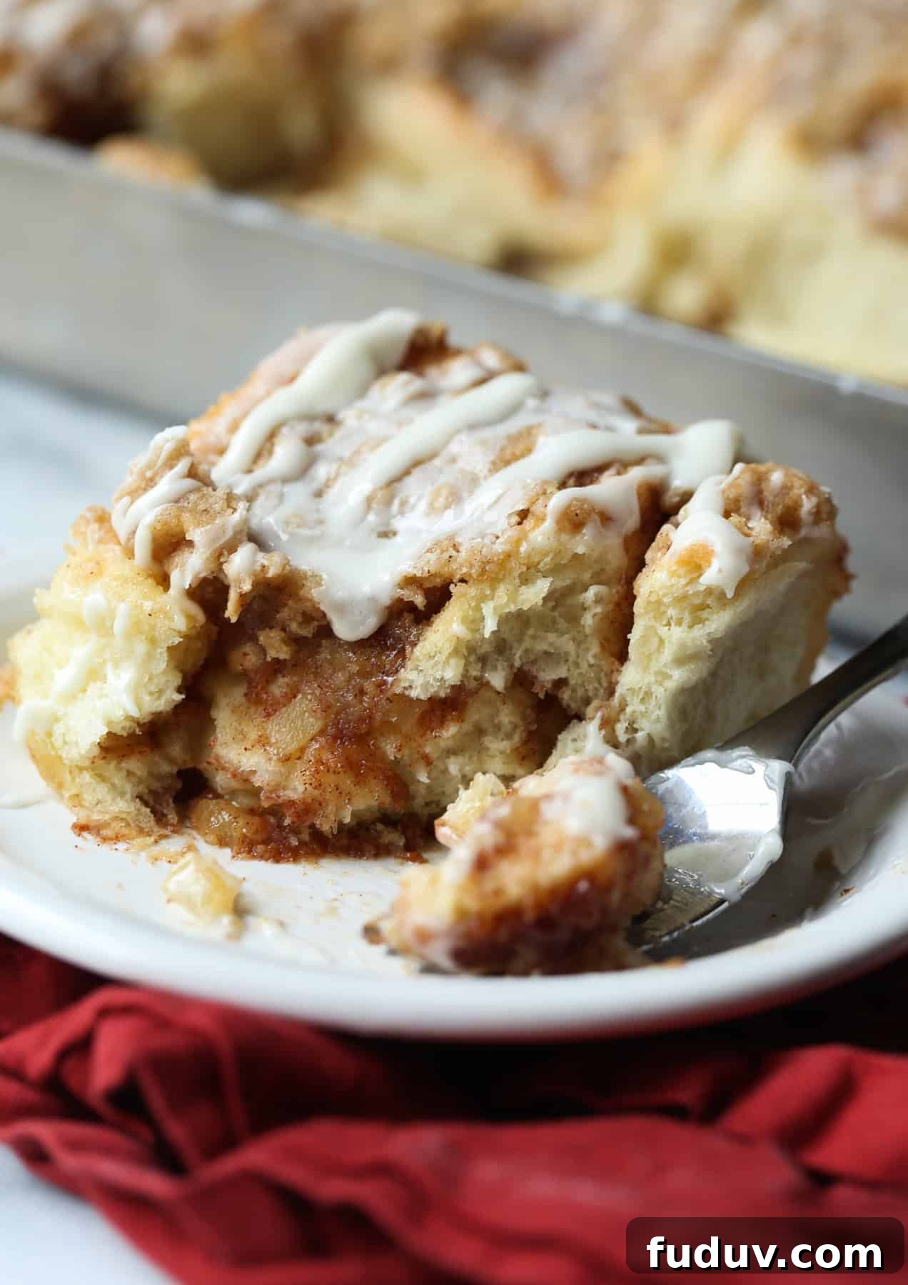 Apple Crumb Cinnamon Rolls are soft, delicious cinnamon rolls filled with diced apples and topped with crumb topping. It’s the perfect mash-up of two classic breakfast sweets, crumb cake and cinnamon rolls! Apple Crumb Cinnamon Rolls