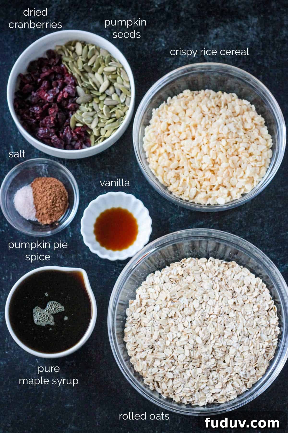 Vegan Pumpkin Spice Granola Recipe for Fall Breakfasts 3 Recipe ingredients arrayed in individual bowls.