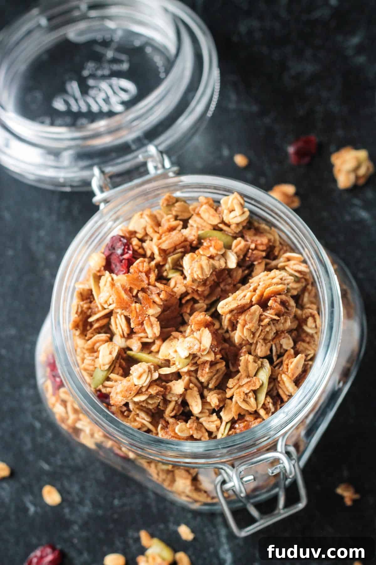 Vegan Pumpkin Spice Granola Recipe for Fall Breakfasts 10 Overhead view of an open jar filled with pumpkin spice granola.
