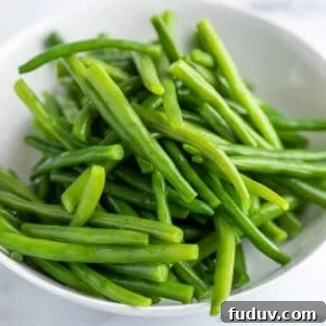A bowlful of blanched green beans.