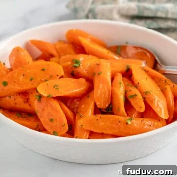 A dish filled with Maple Glazed Carrots.