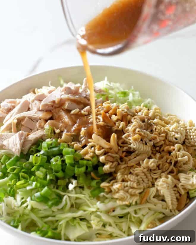 Crispy Ramen Noodle Salad with Sesame Ginger Dressing 4 dressing poured on salad