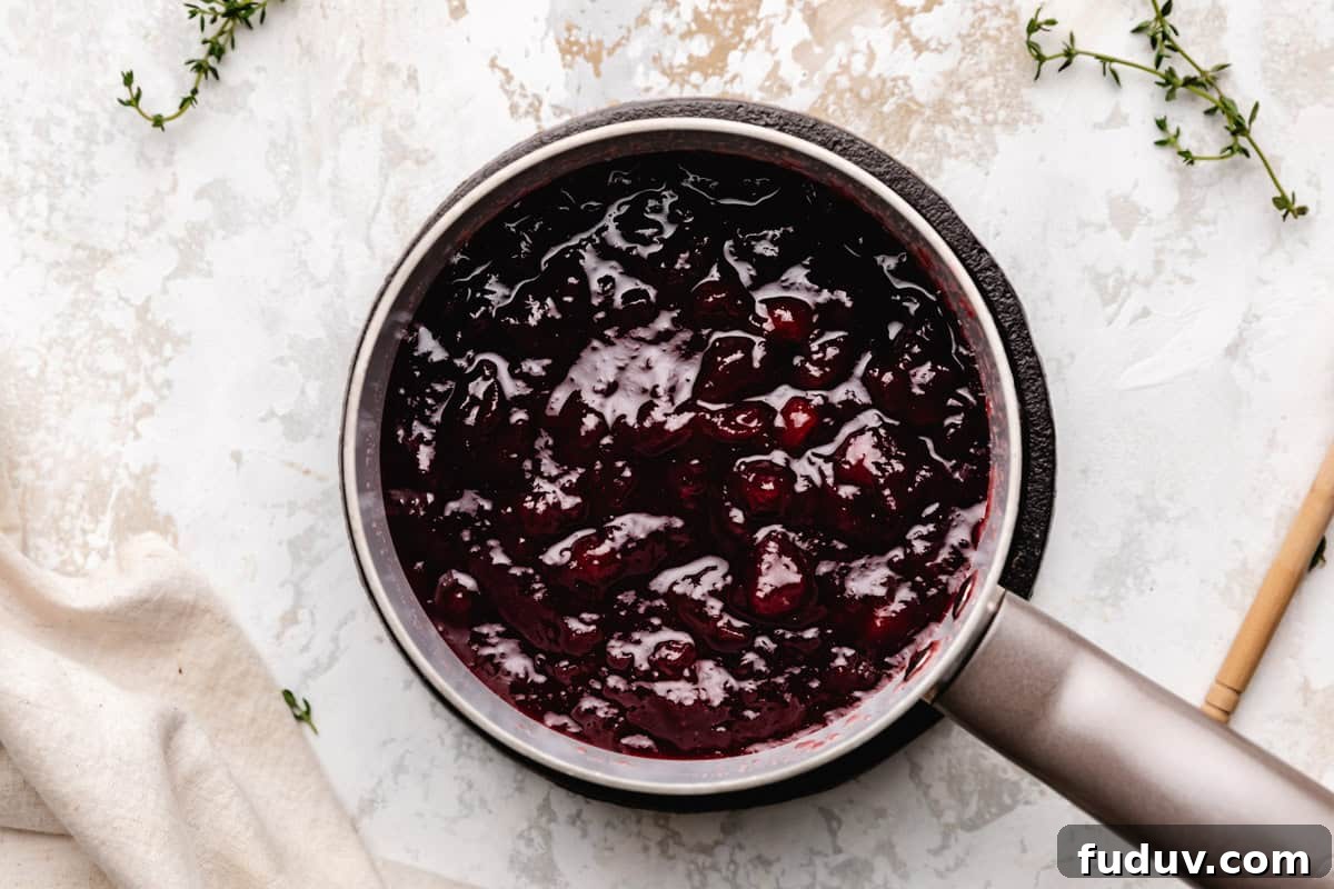 Canned cranberry sauce in a pan.