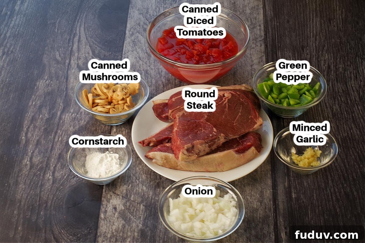 ingredients in slow cooker swiss steak in glass bowls, labelled