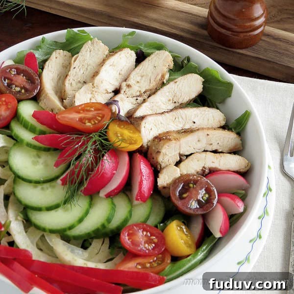 Grilled chicken salad with vegetables in a bowl