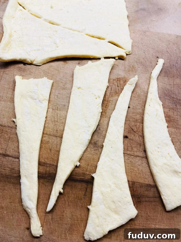 Crispy Air Fryer Pigs in a Blanket Recipe 3 crescent roll dough cut in half