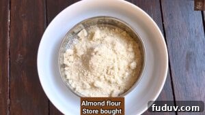 No-Cook Almond Katli Recipe — Quick Homemade Badam Burfi 5 Mixing almond flour and sugar
