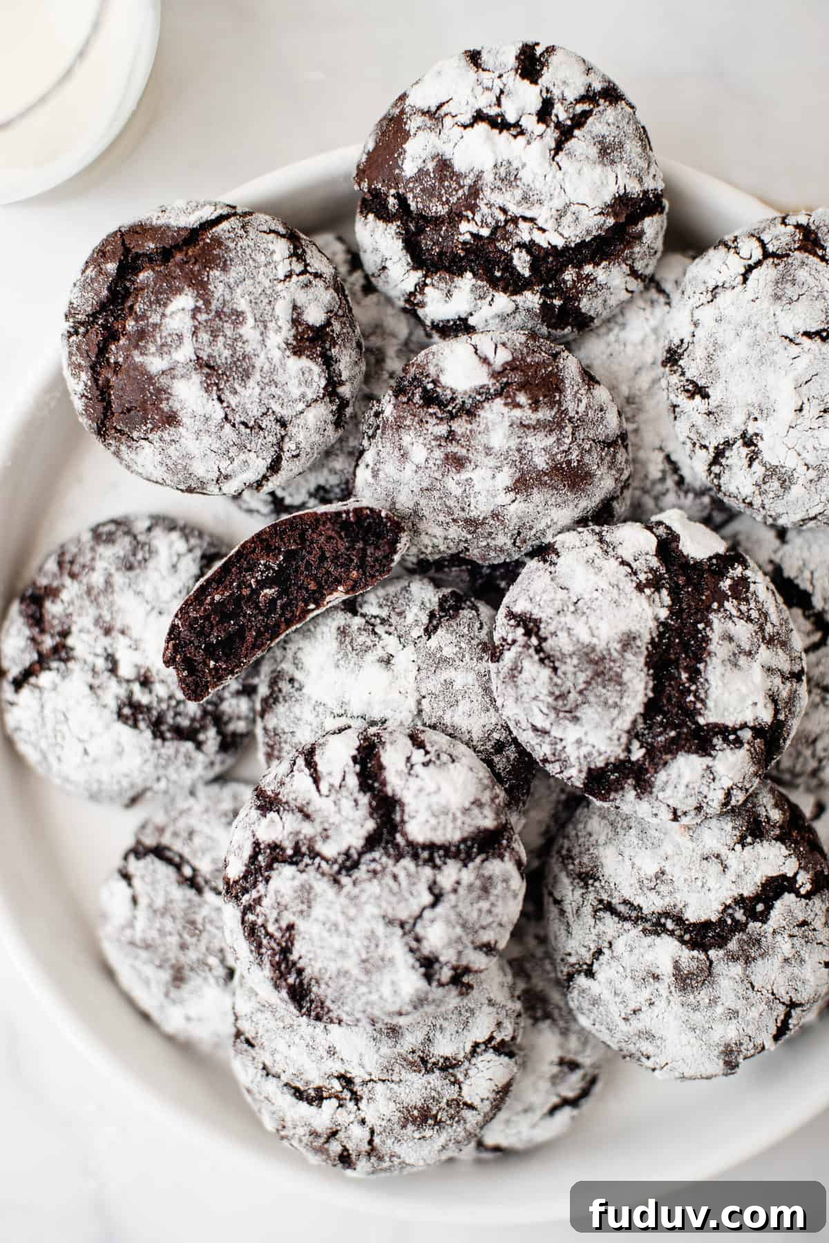 baked and finished chocolate crinkles served on a plate.