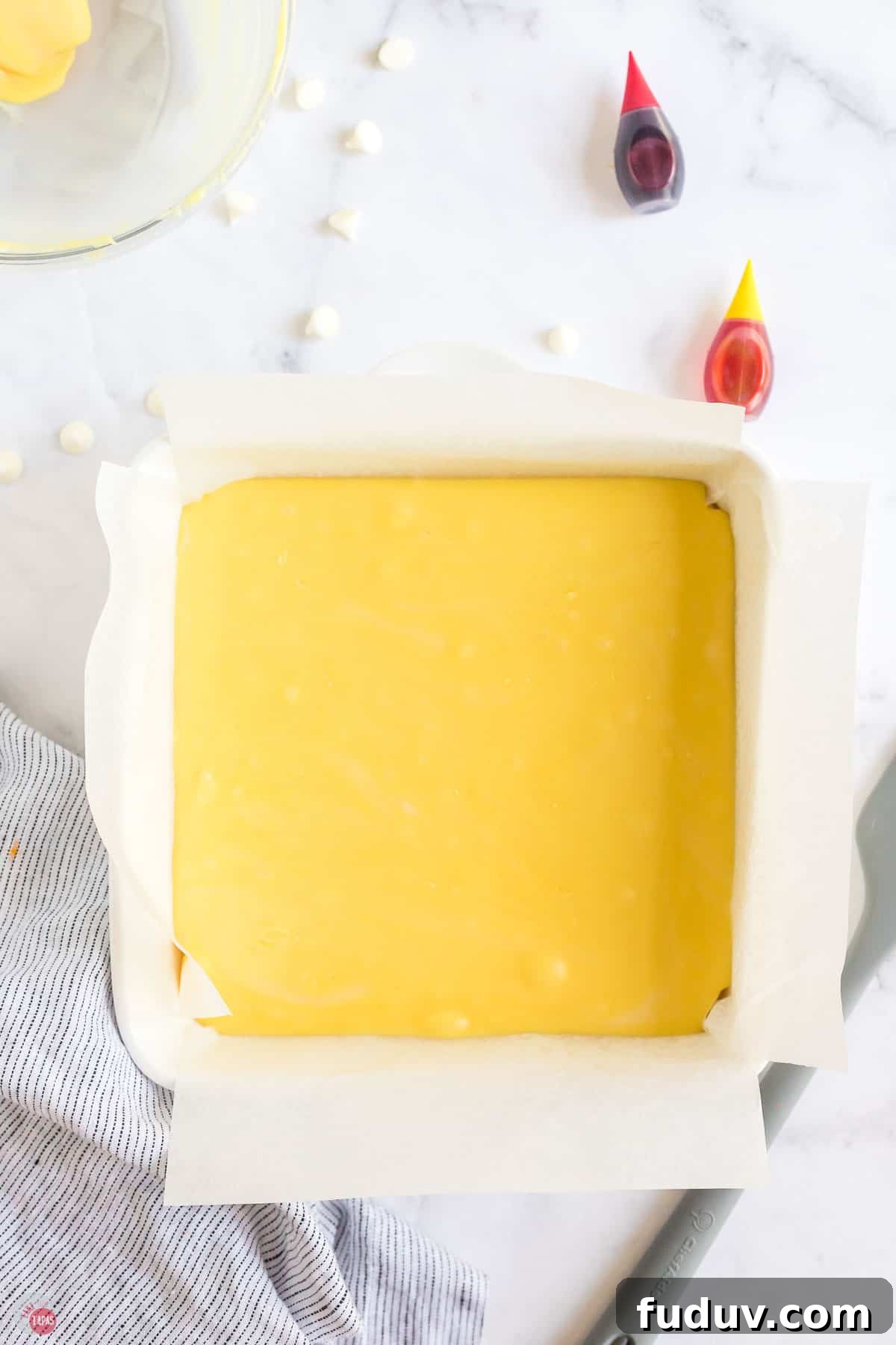 Candy Corn Fudge Recipe: Creamy Halloween Candy Treat 6 square dish with yellow fudge in it