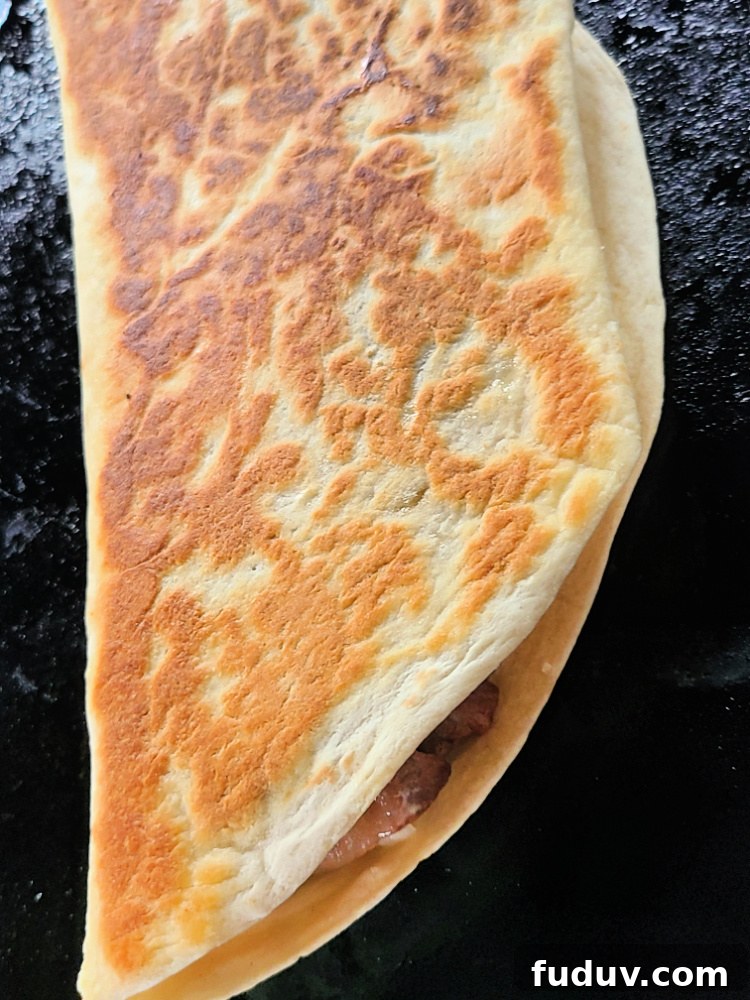 Prime Rib Quesadilla cooking on blackstone griddle