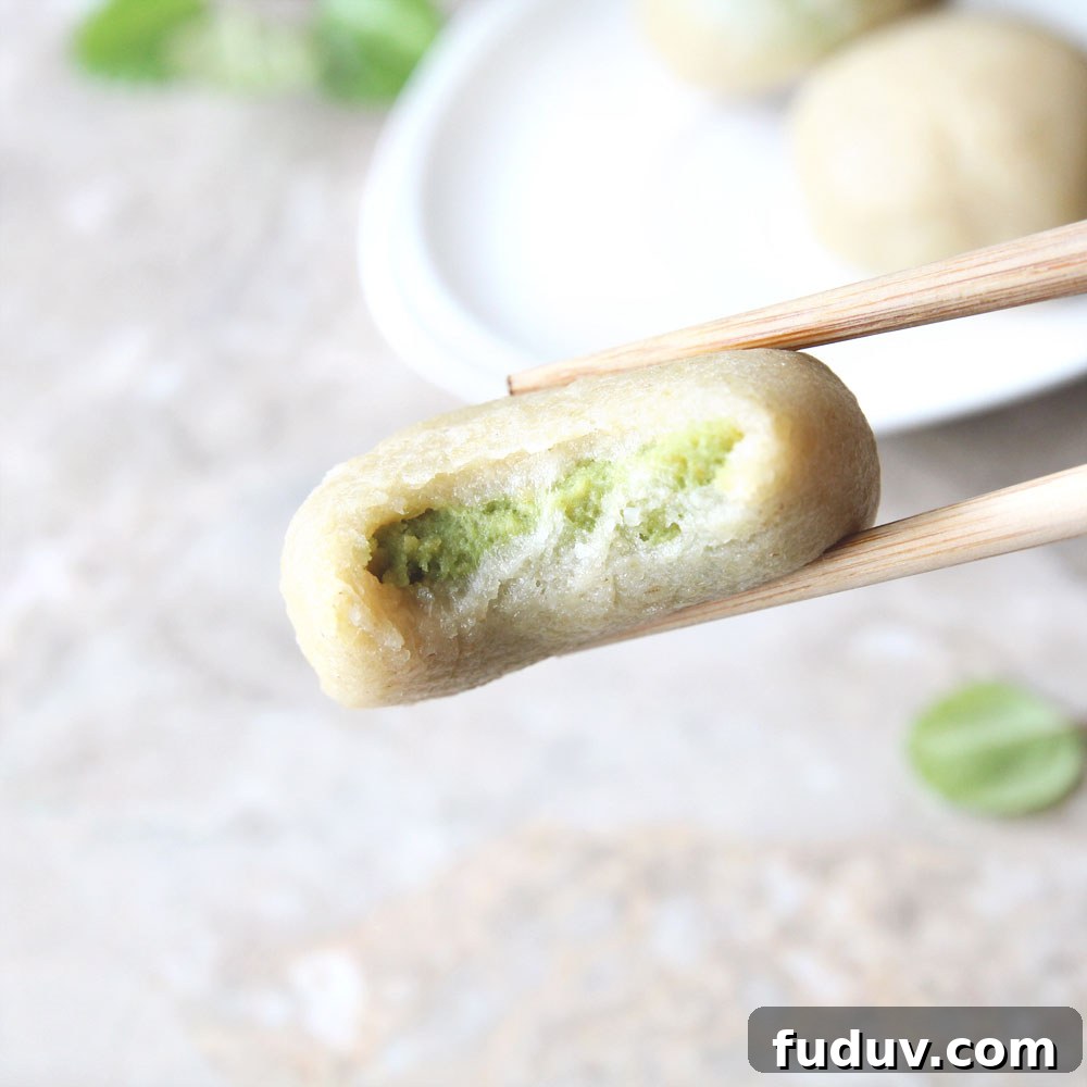 eating matcha brown rice mochi
