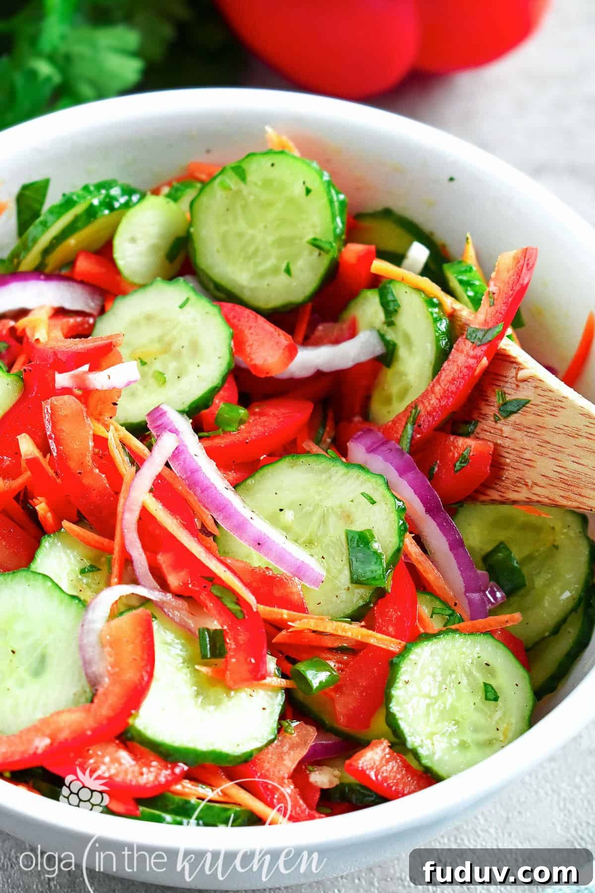 Crisp Cucumber Salad: crunchy, crispy texture with a touch of sweetness. The combination of fresh veggies will make you crave this salad all-summer long. | olgainthekitchen.com