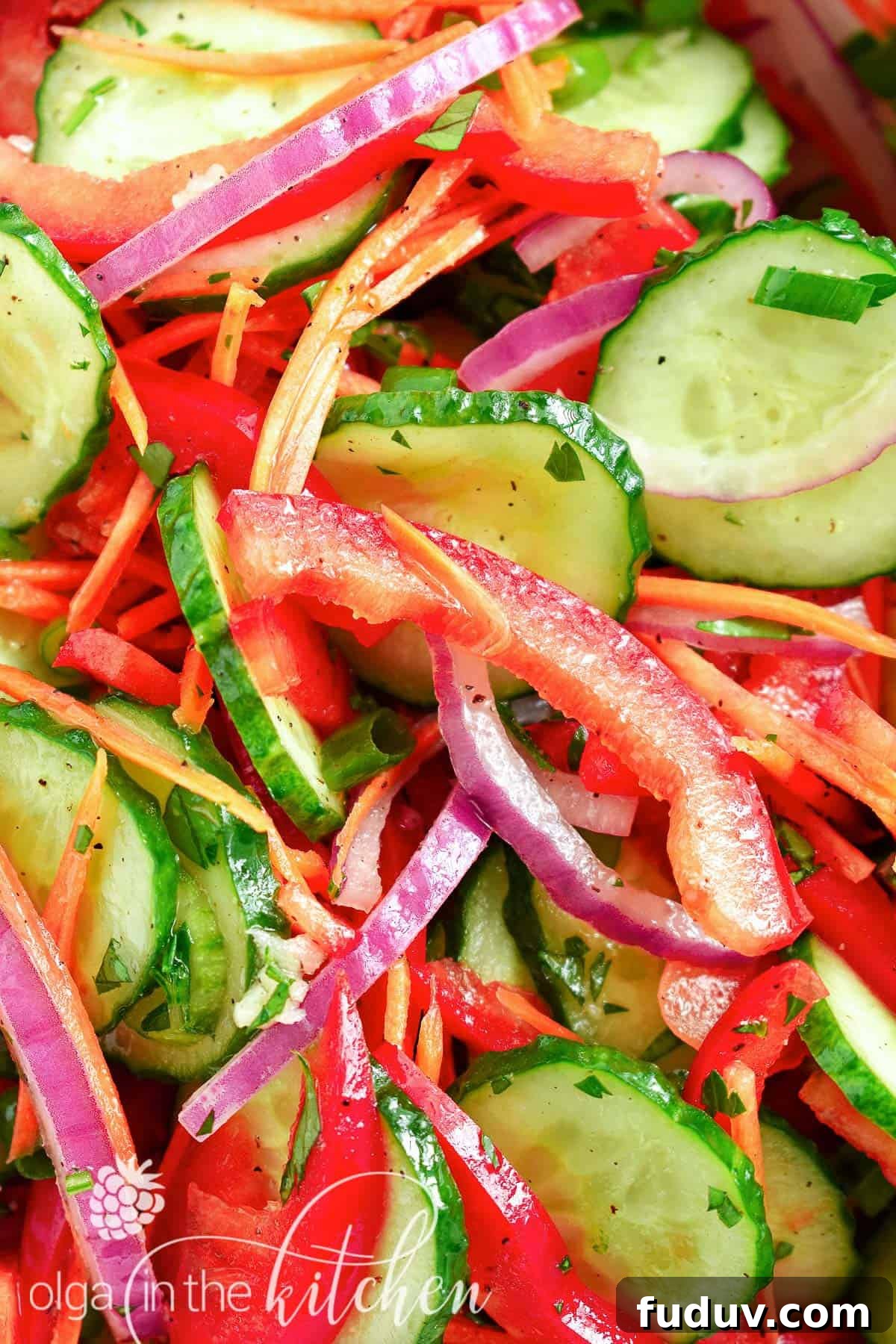 Crisp Cucumber Salad: crunchy, crispy texture with a touch of sweetness. The combination of fresh veggies will make you crave this salad all-summer long. | olgainthekitchen.com