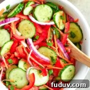 Crisp Cucumber Salad: crunchy, crispy texture with a touch of sweetness. The combination of fresh veggies will make you crave this salad all-summer long. | olgainthekitchen.com