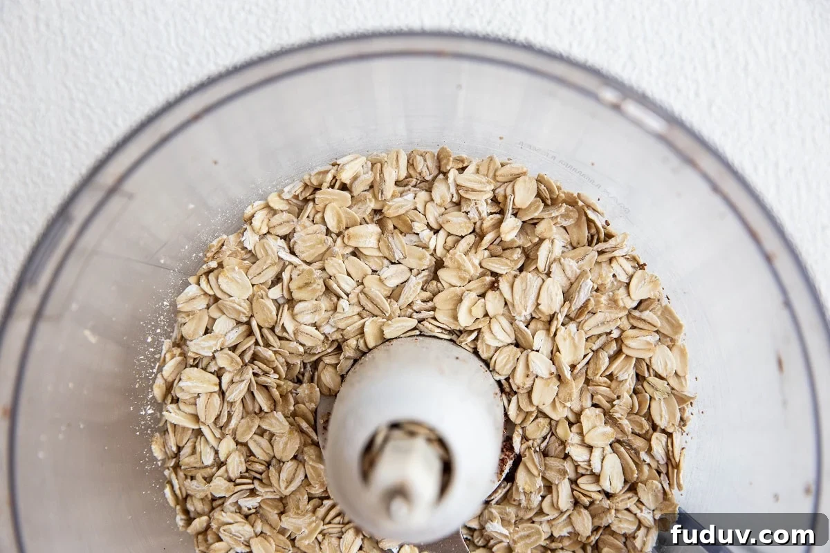 5-Ingredient Chocolate Date Energy Bites for Quick Fuel 7 Oats in a food processor for energy balls