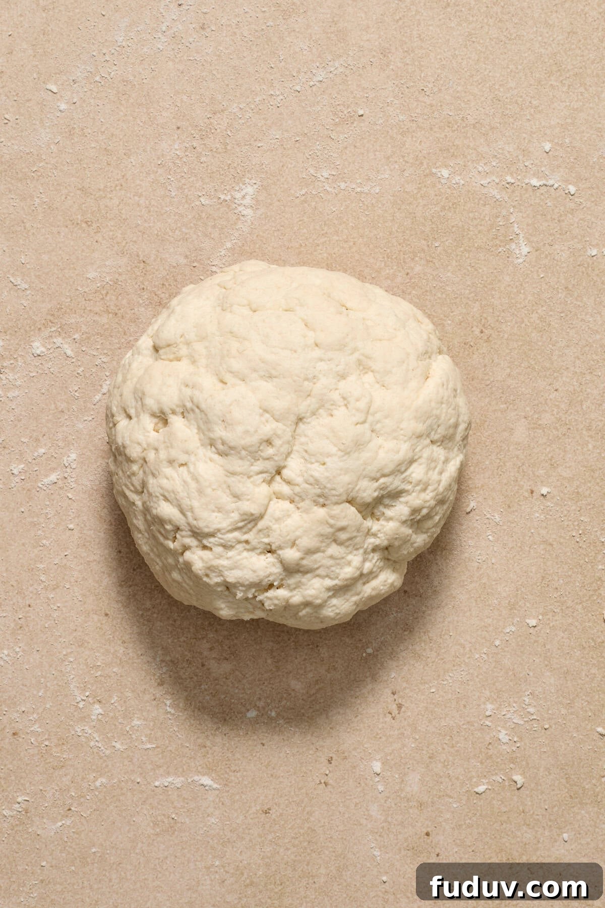 Ball of dough on surface. 