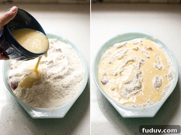Liquid ingredients being pour on top of the flour mixture