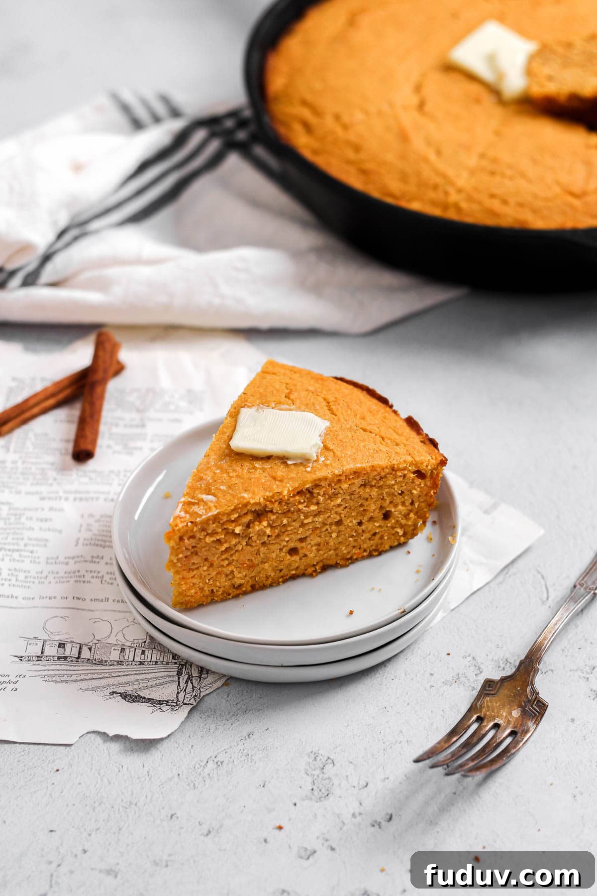Sweet Potato Cornbread Recipe with Maple Butter Glaze 3 slice of sweet potato cornbread with butter