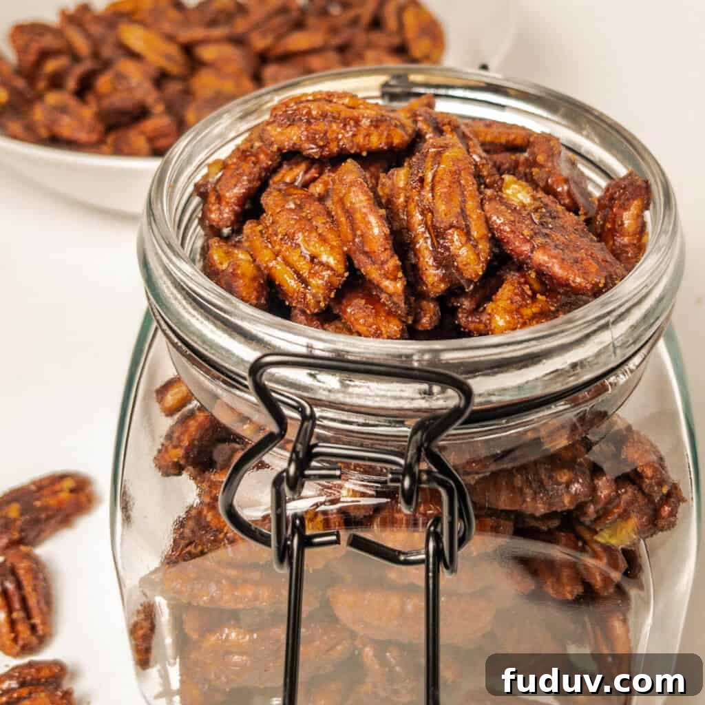 Quick Candied Pecans Recipe: Sweet Glazed Pecans in 20 Minutes 2 candied pecans in a buckle jar