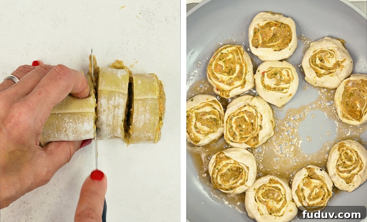 Crispy Homemade Dumpling Rolls: Step-by-Step Recipe 8 A hand slices rolled dough with filling on a white surface. Next to it, uncooked pinwheel-shaped dough pieces with filling are arranged in a round baking dish.