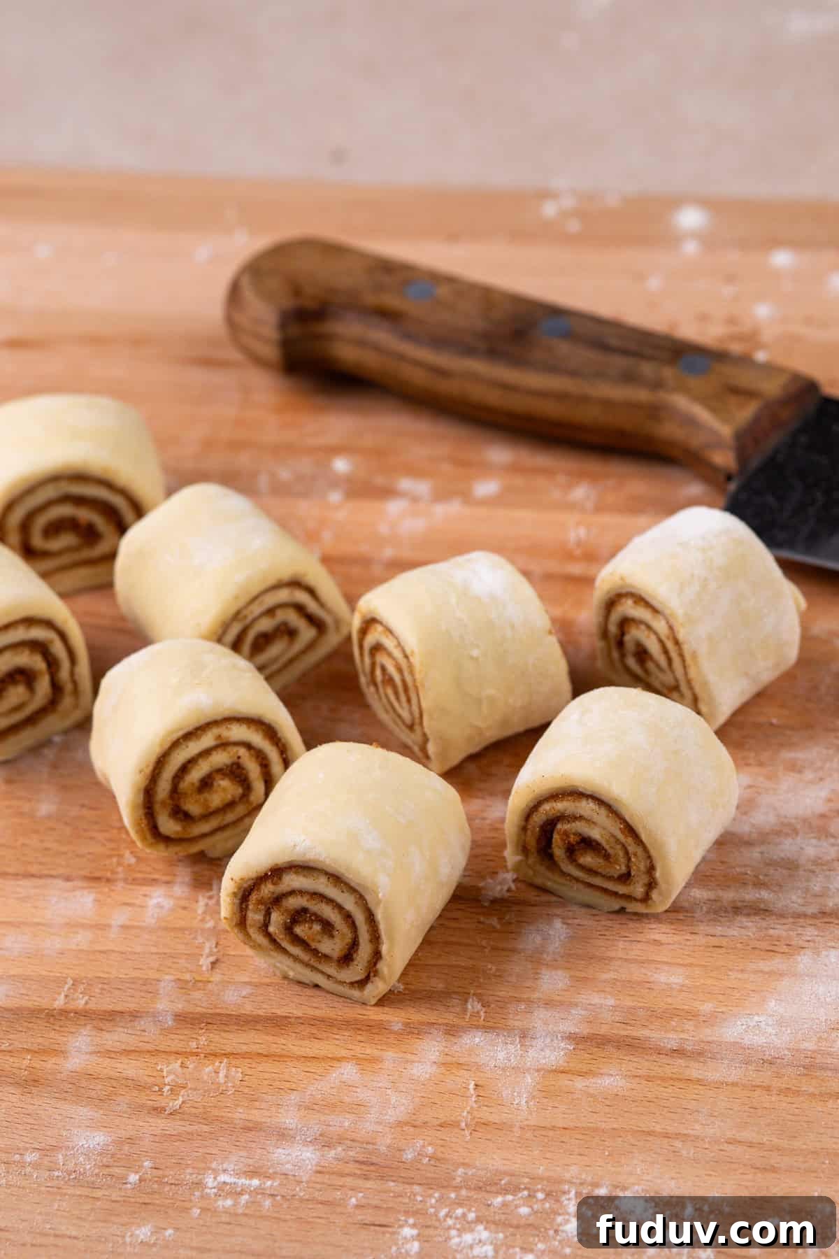 Sliced pieces of puff pastry cinnamon rolls.