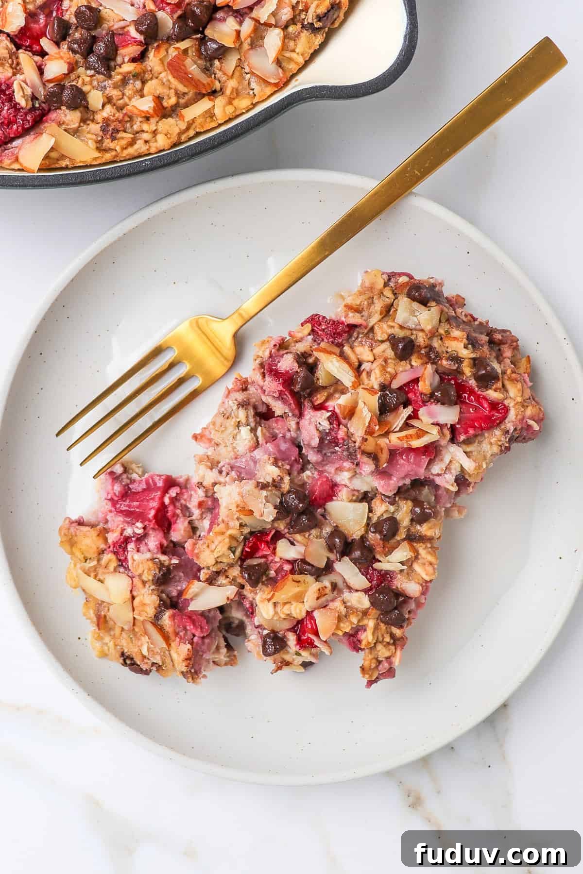 Baked oats served soon a plate with milk.
