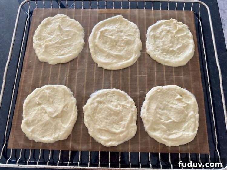 keto croque monsieur buns on an oven tray