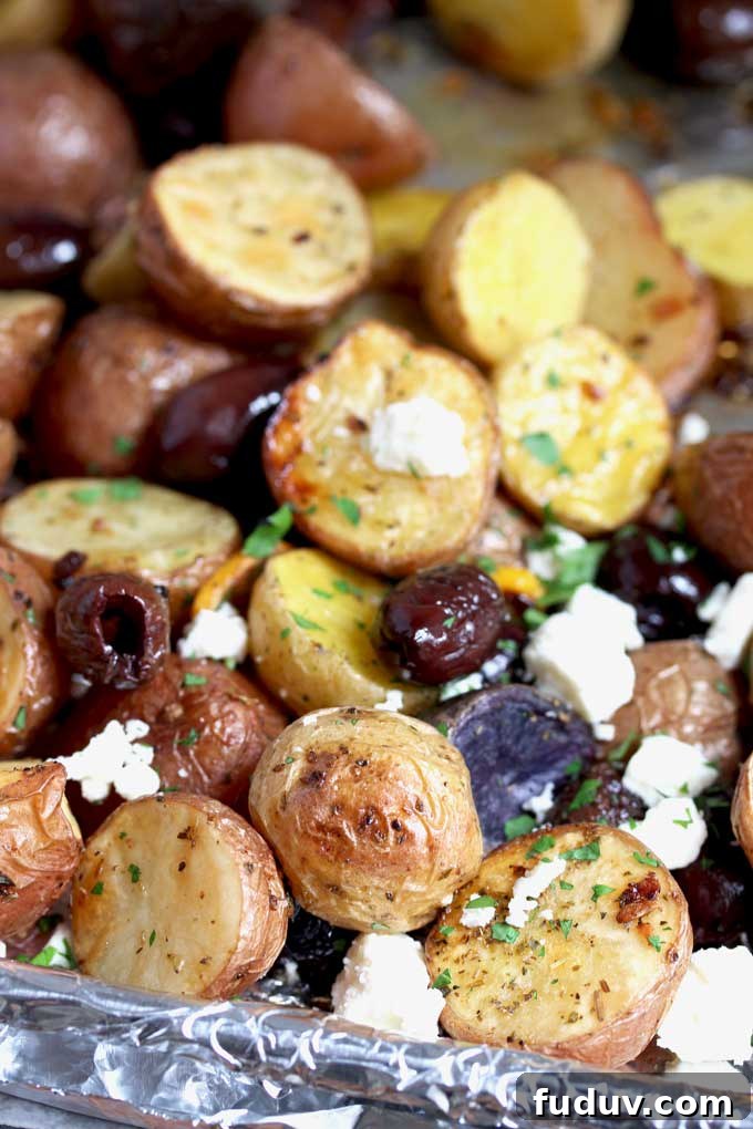 Crispy Greek-Style Roasted Potatoes with Lemon and Oregano 7 Roasted Greek Potatoes on a sheet pan.