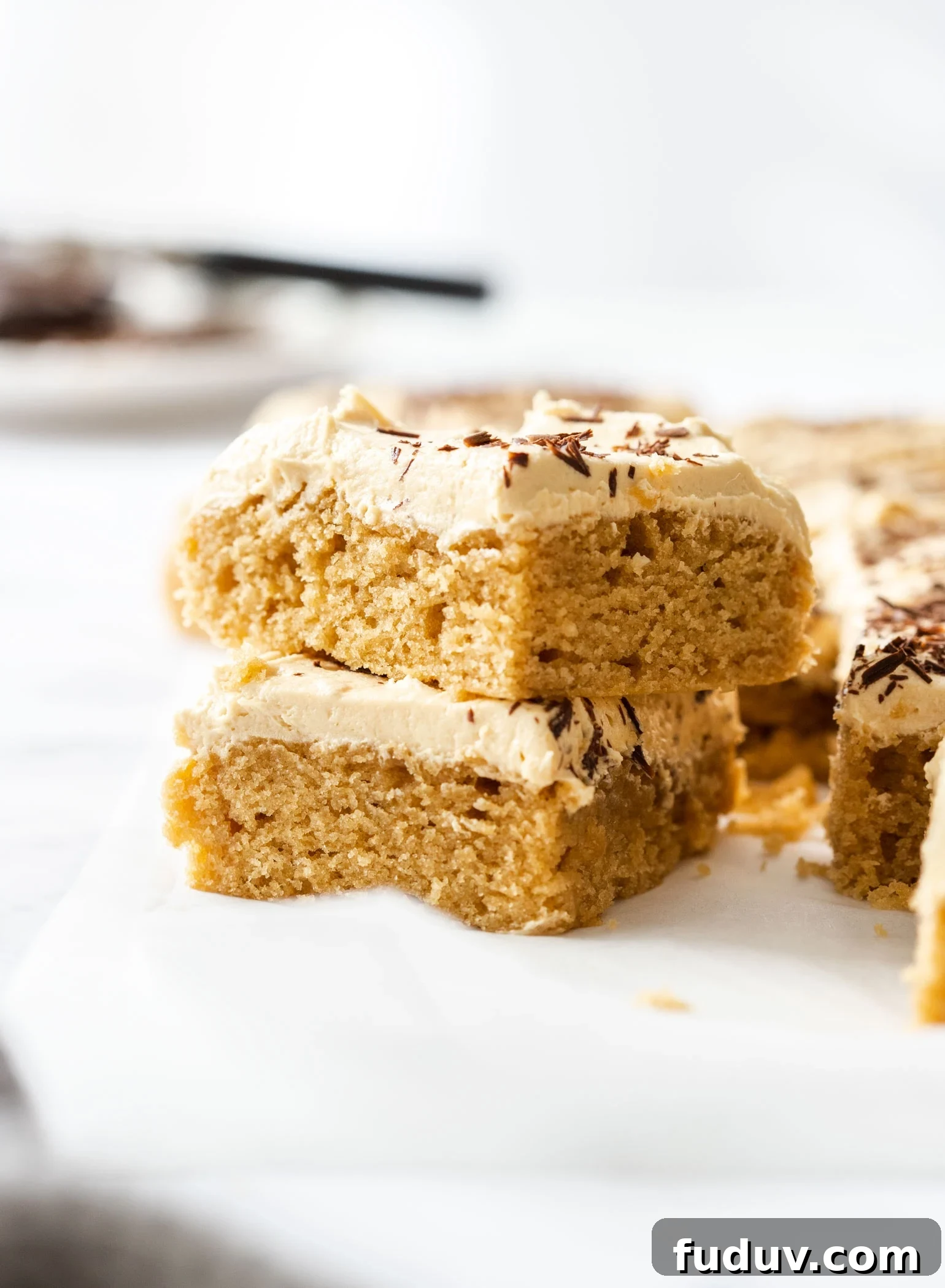 Ultimate Peanut Butter Sheet Cake Recipe for Gatherings 2 2 slices of peanut butter sheet cake sitting atop one another