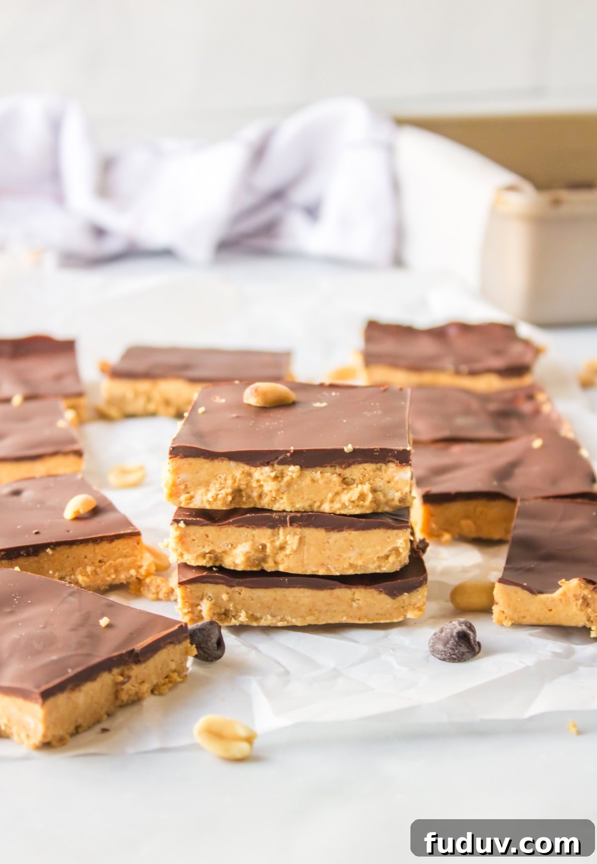 three stacked no bake peanut butter bars