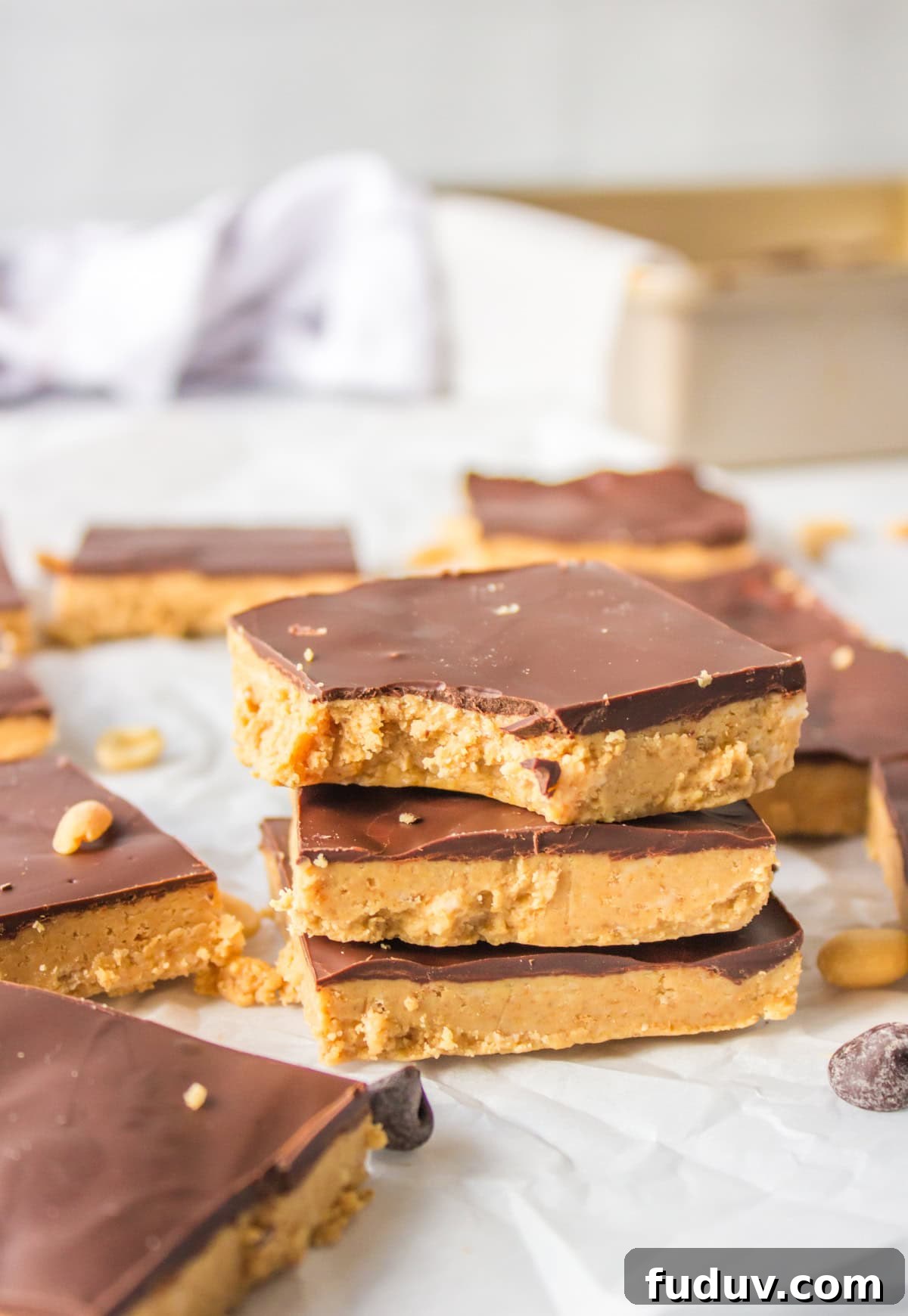 three stacked no bake peanut butter bars