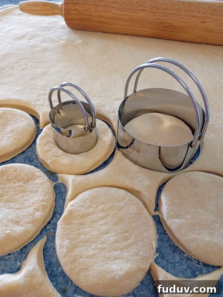 cutting donuts with donut cutters.