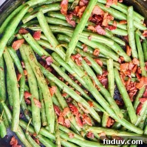 close up of skillet full of green beans