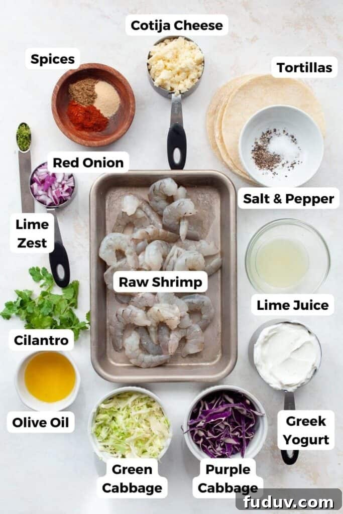 all ingredients in baja shrimp tacos in bowls including shrimp, greek yogurt, cilantro, cabbage, lime, spices, salt, pepper, tortillas, and red onion