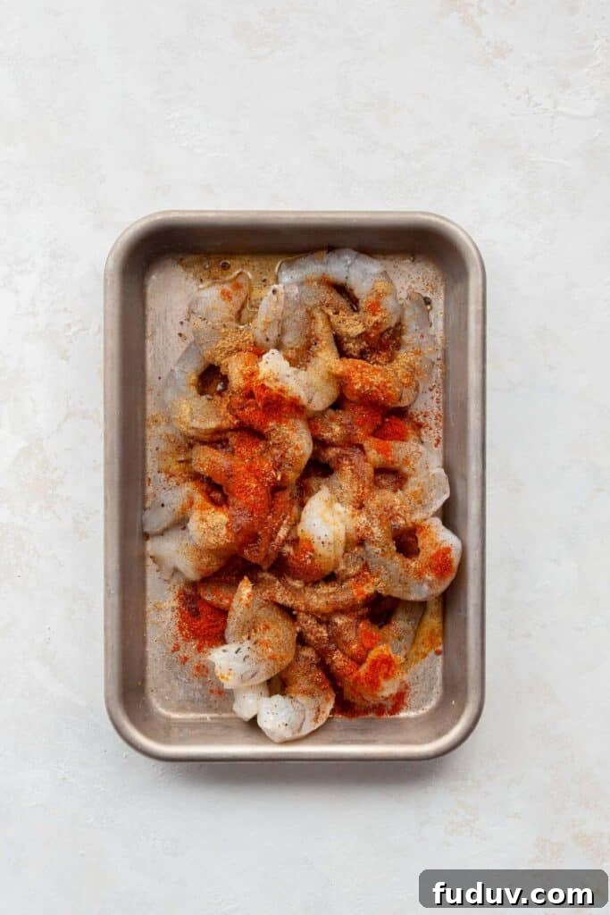 raw shrimp seasoned with Baja spices on a serving tray