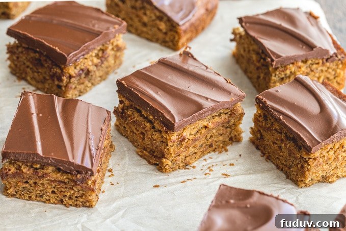 Pieces of whole wheat banana cake topped with chocolate.