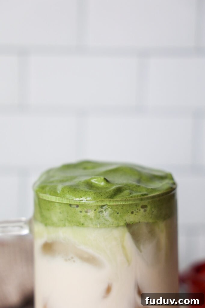 Strawberry Dalgona Matcha Latte Recipe: Creamy Whipped Green Tea Beverage 4 Strawberry Matcha latte.