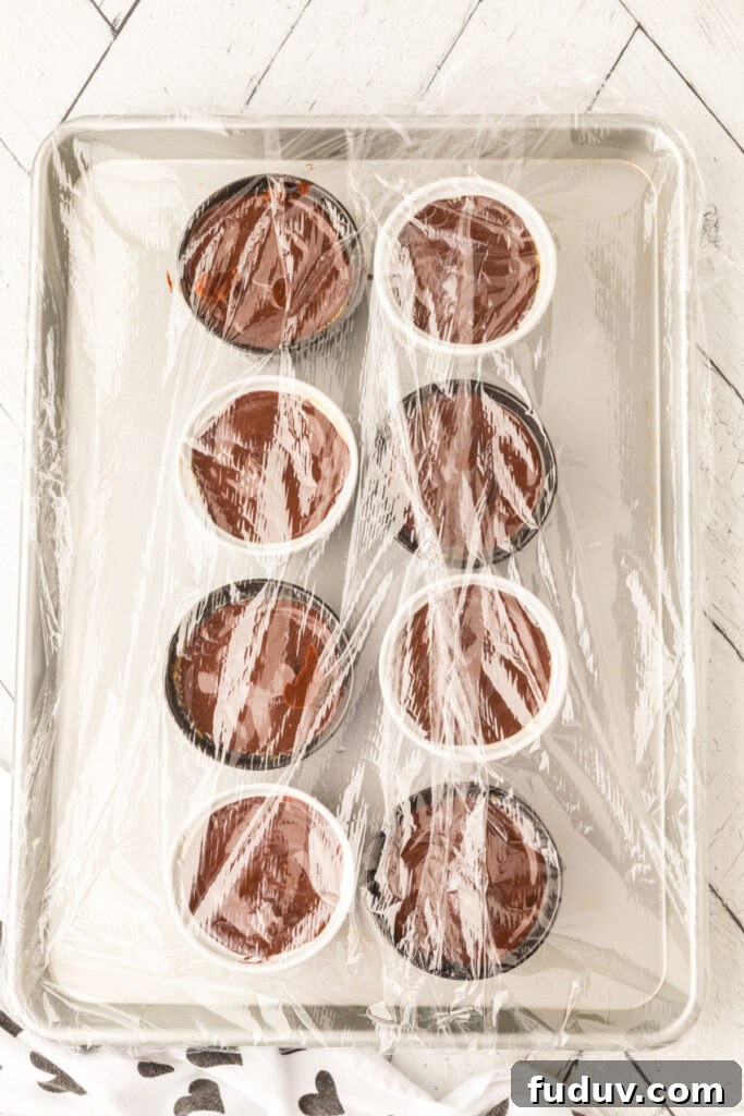 Cappuccino Crème Brûlée desserts covered with plastic wrap