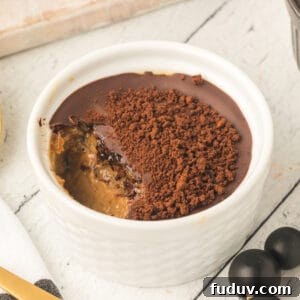 Square image of Cappuccino Crème Brûlée topped with chocolate and espresso garnish in a white ramekin
