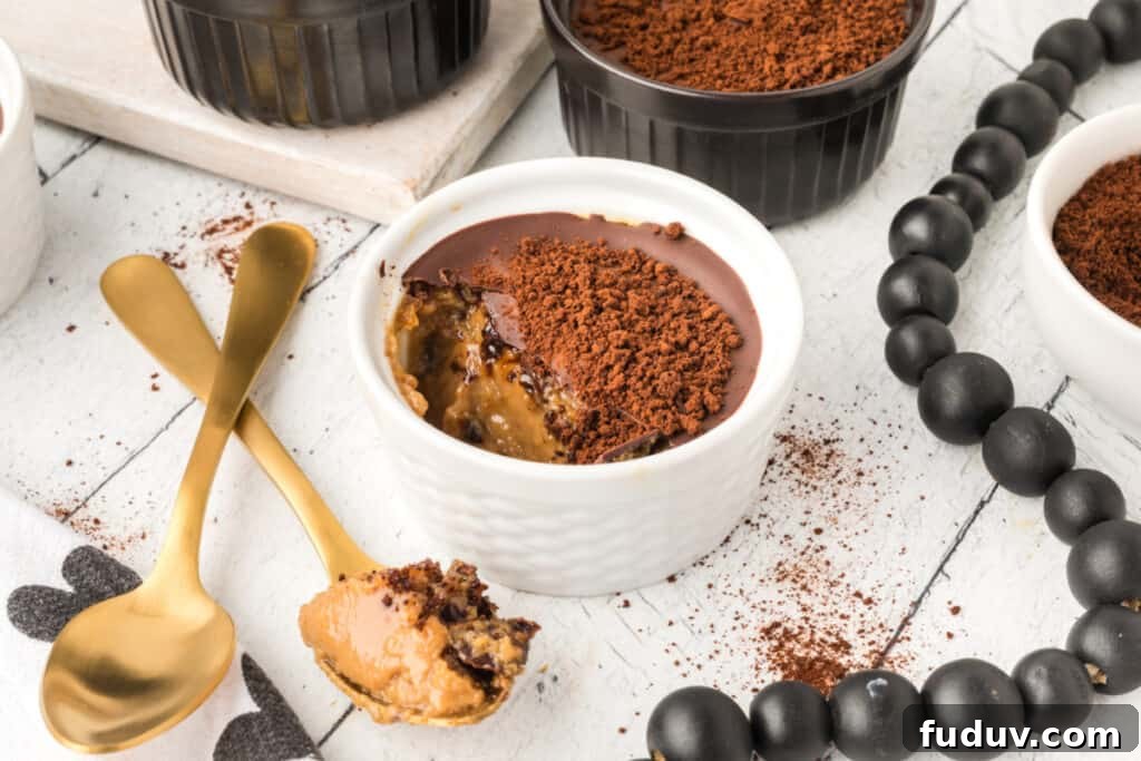 Cappuccino Crème Brûlée with creamy espresso custard, chocolate topping, and finely ground espresso garnish served with gold spoons