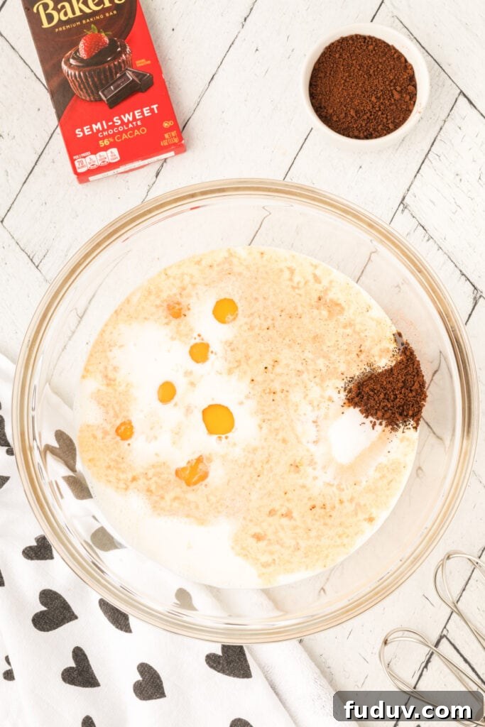 Ingredients for Cappuccino Crème Brûlée combined in a glass mixing bowl