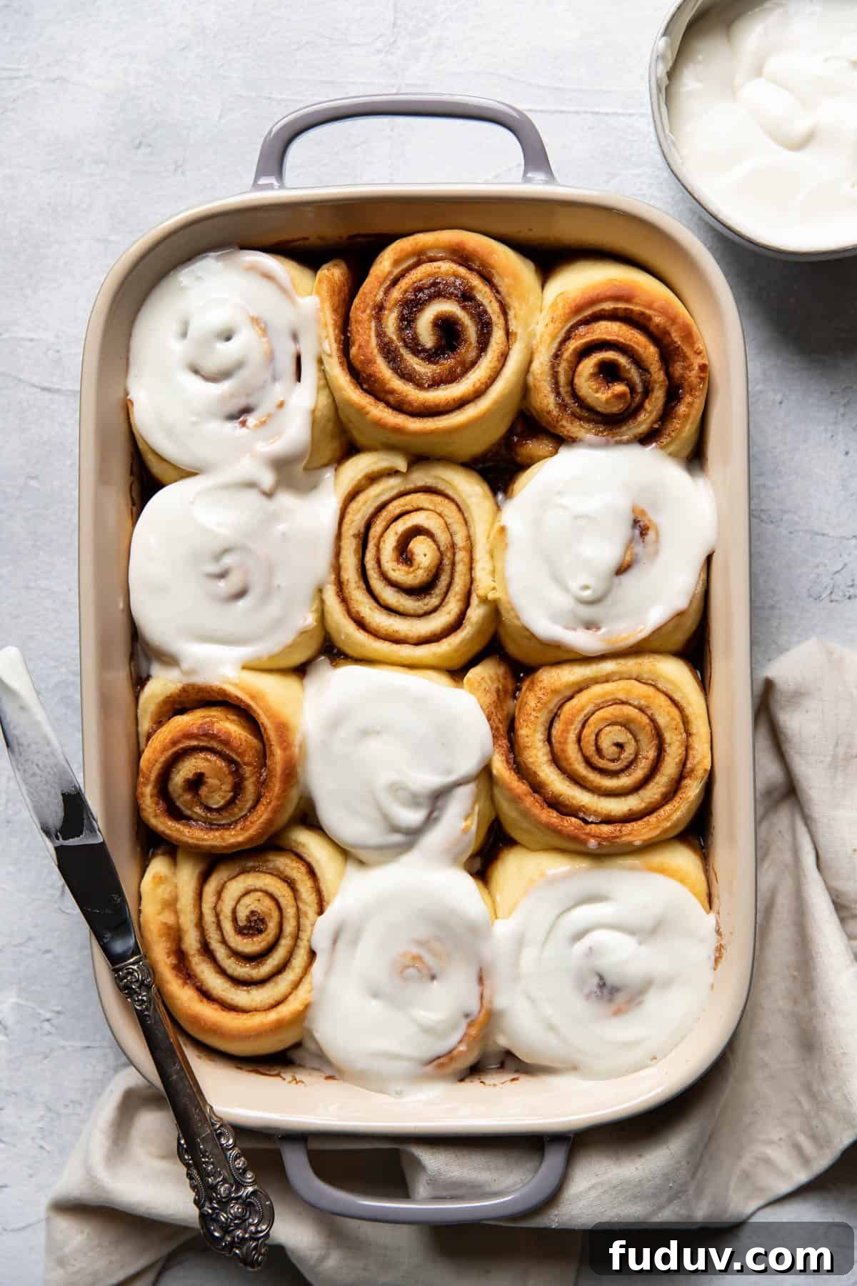 overnight cinnamon rolls in a baking dish.