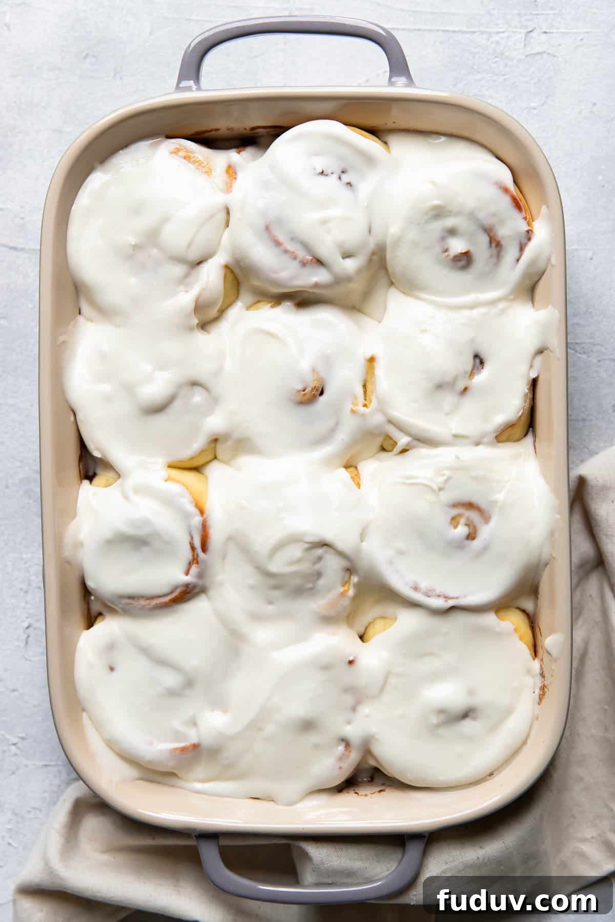 overnight cinnamon rolls in a baking dish.