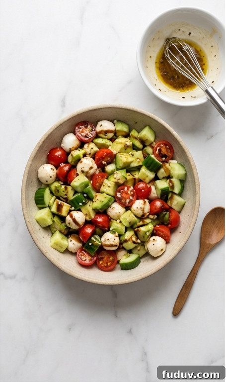 Cucumber Mozzarella Salad Recipe for Fresh Summer Meals 3 Whisking dressing