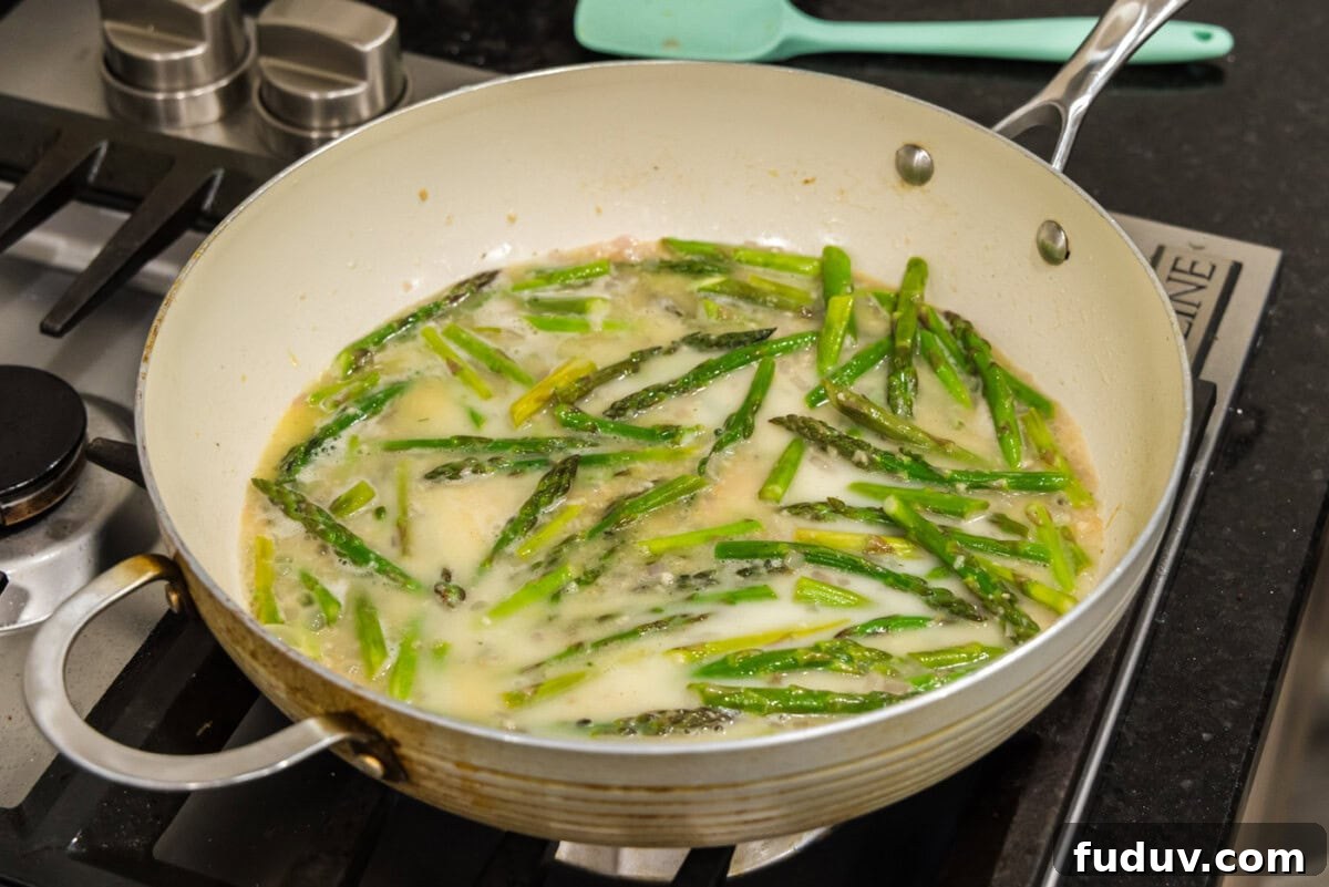 cornstarch slurry added to thicken asparagus pasta sauce